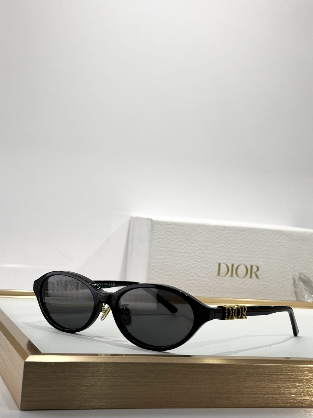 Dior Luxury Oval Sunglasses with Signature Gold Logo Temples