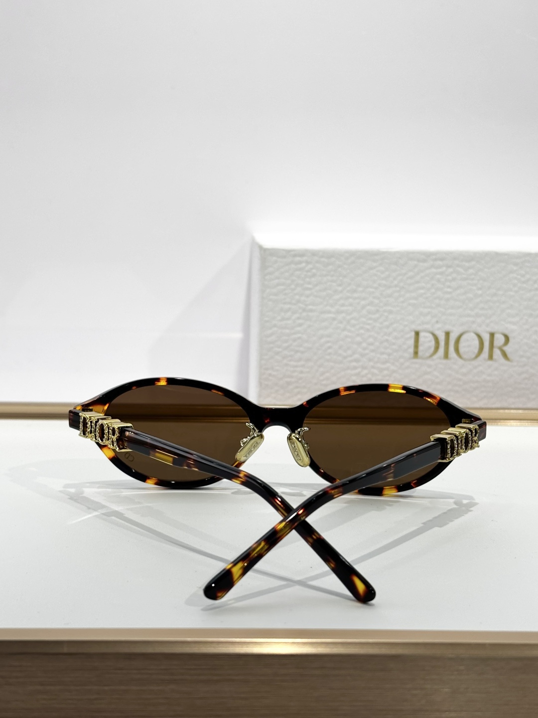 Dior Luxury Oval Sunglasses with Signature Gold Logo Temples
