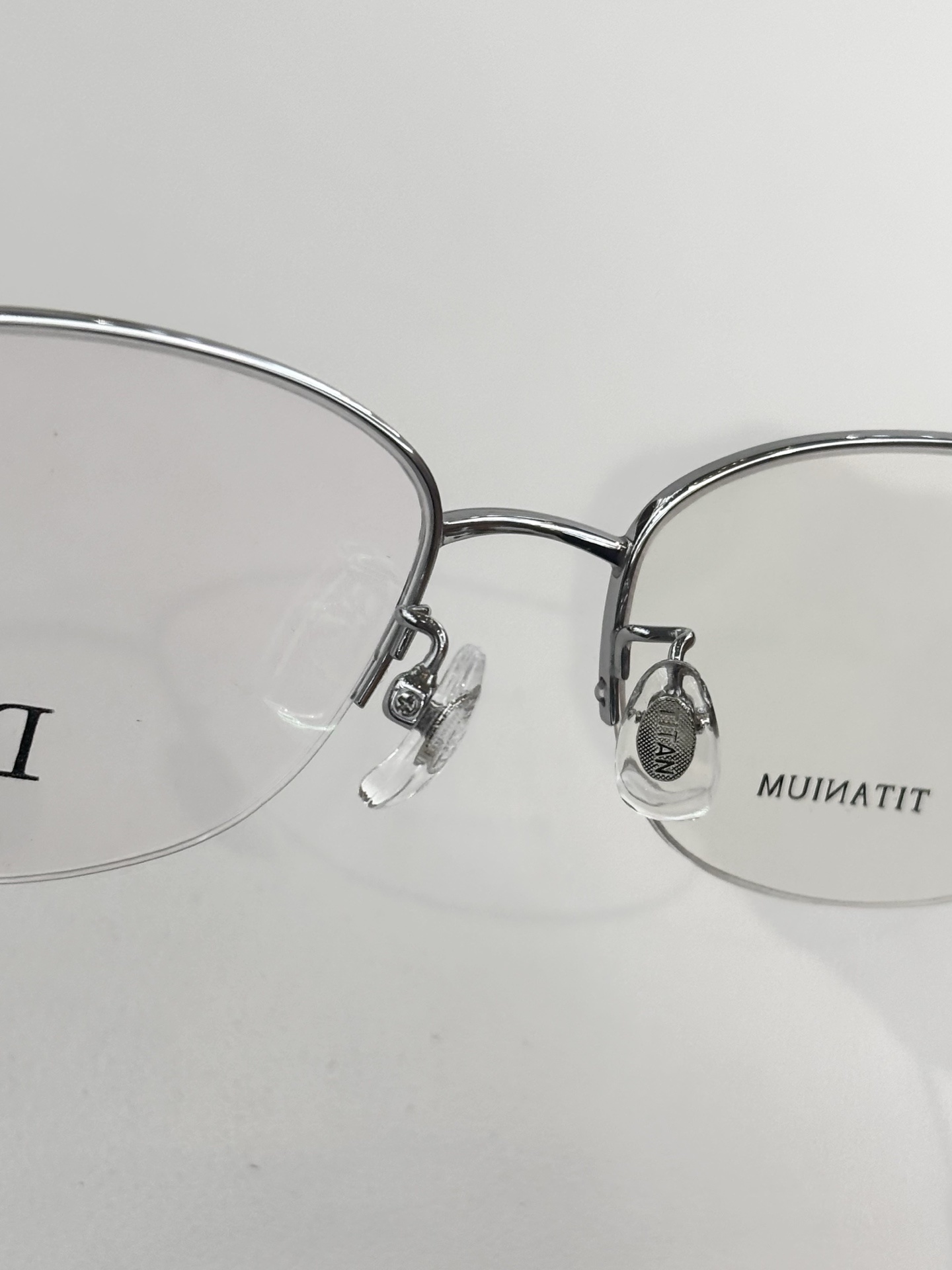 Dior Titanium Luxury Half-Rim Eyeglasses – Elegant Rose Gold