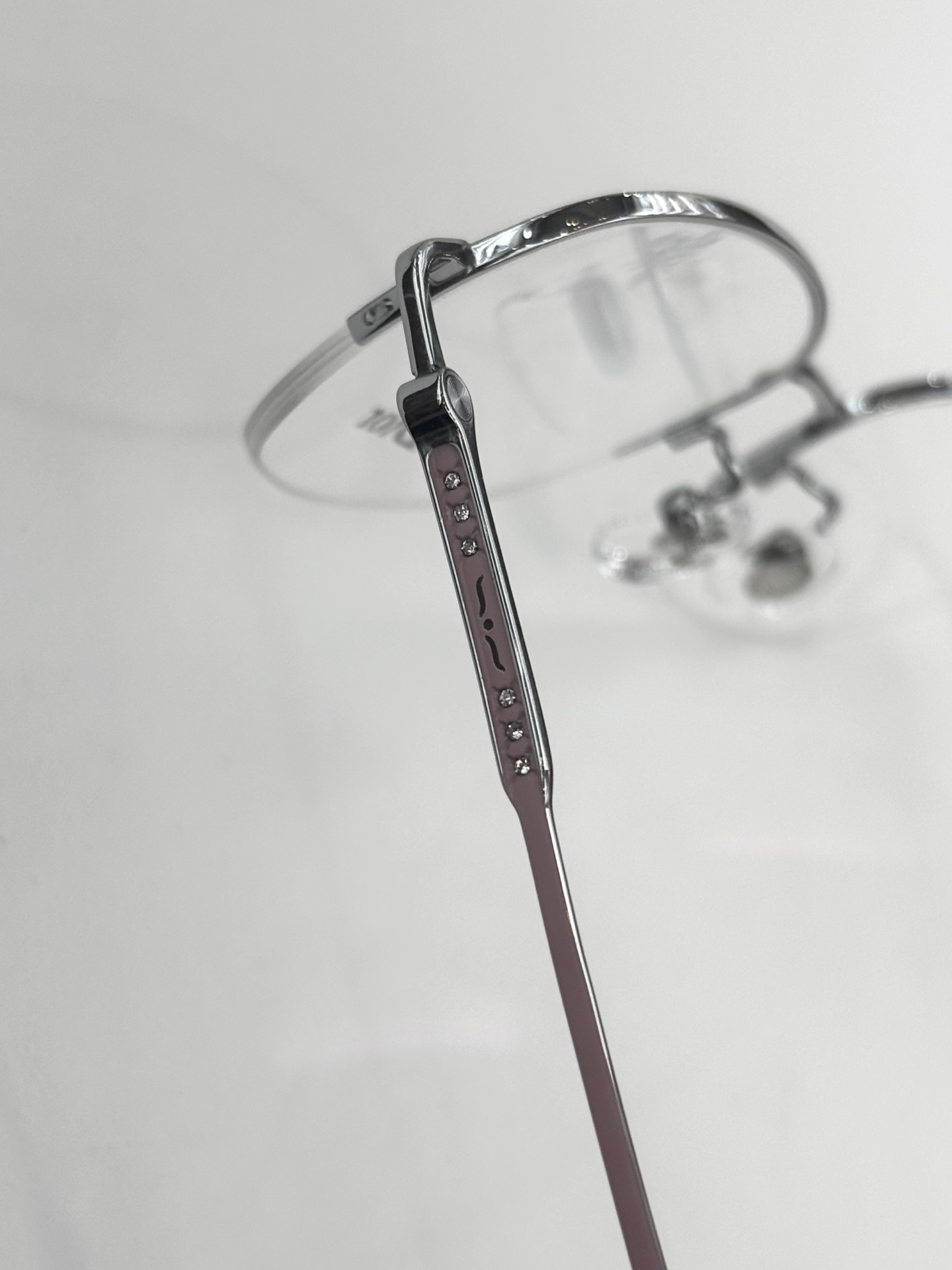 Dior Titanium Luxury Half-Rim Eyeglasses – Elegant Rose Gold