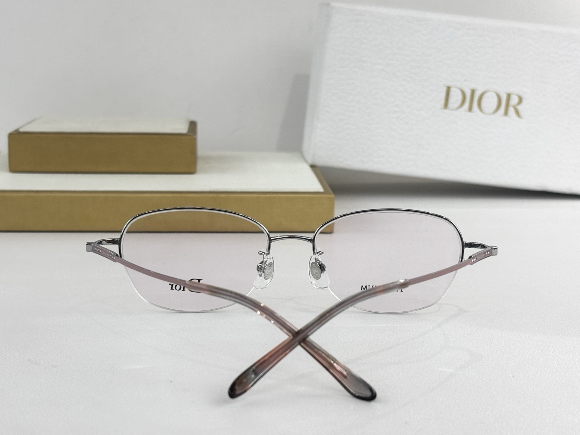 Dior Titanium Luxury Half-Rim Eyeglasses – Elegant Rose Gold