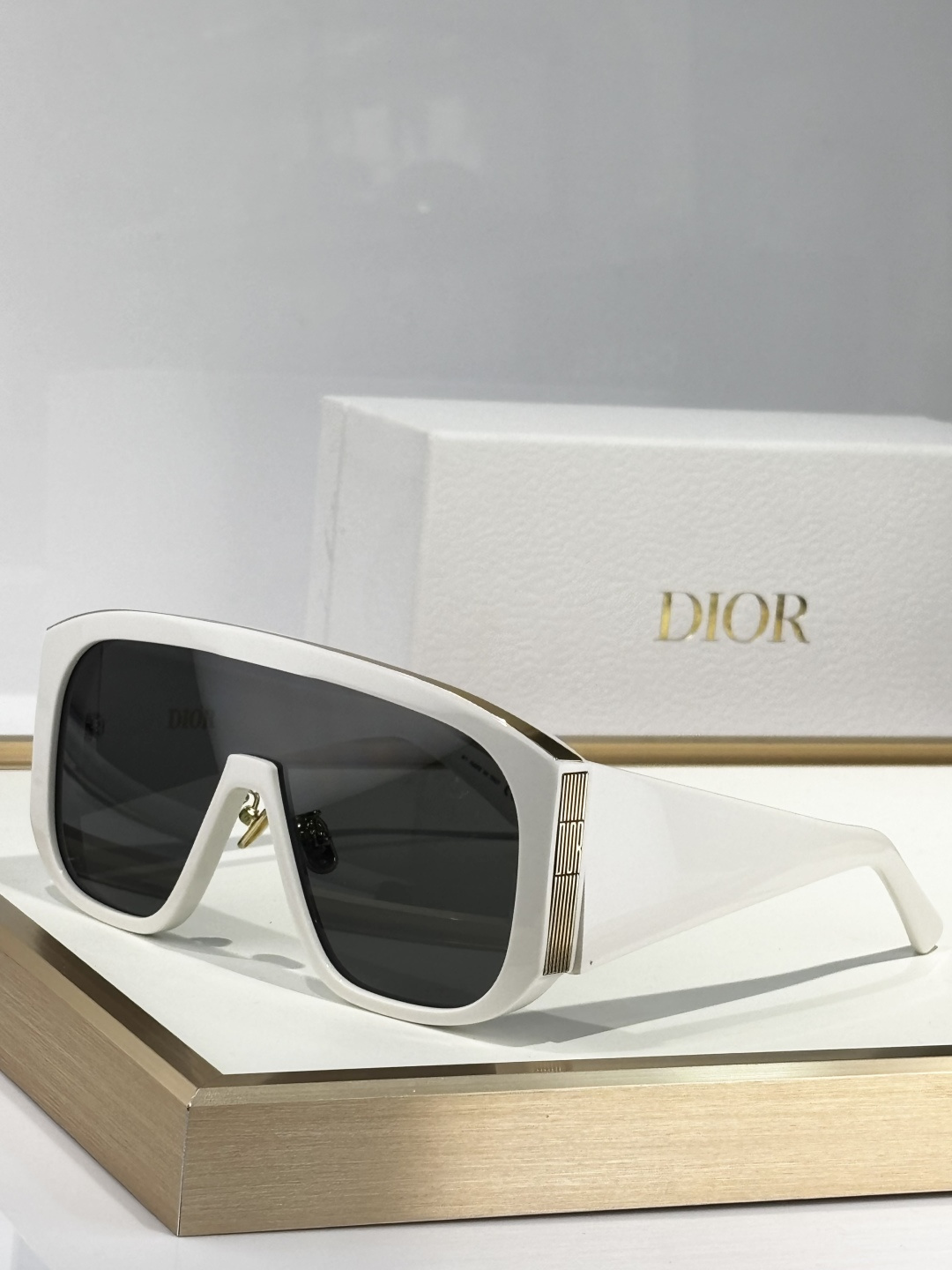 Dior White Shield Sunglasses – Gold Accent