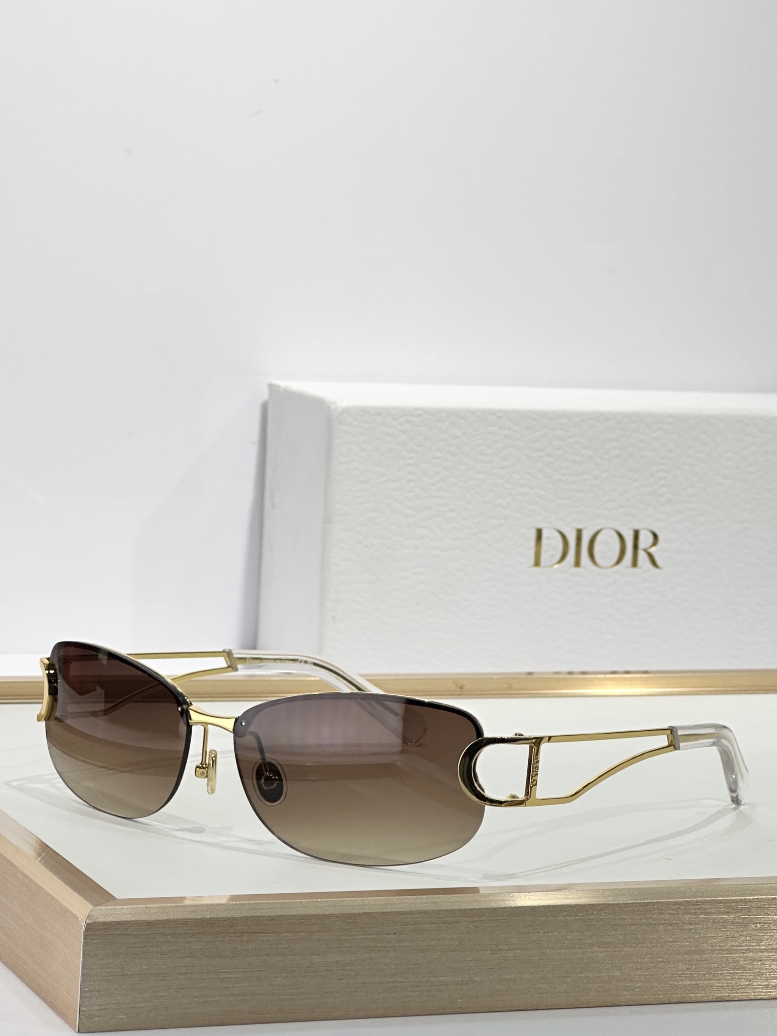 Dior Luxury Rimless Sunglasses – Gold Frame & Brown Lenses