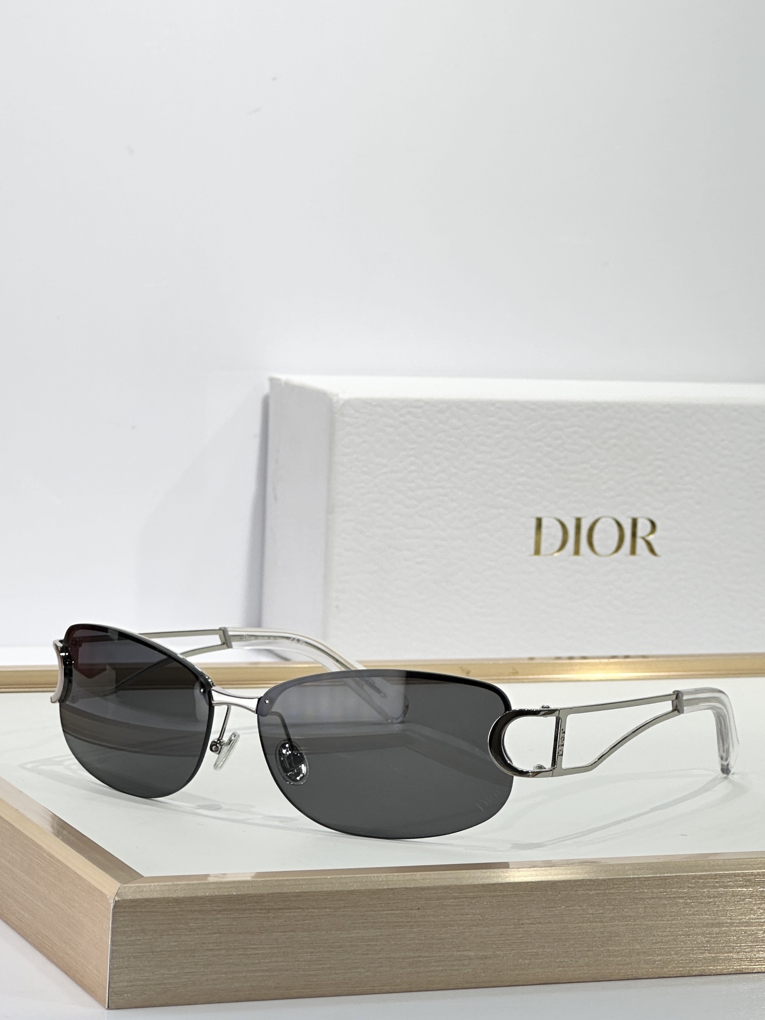 Dior Luxury Rimless Sunglasses – Gold Frame & Brown Lenses
