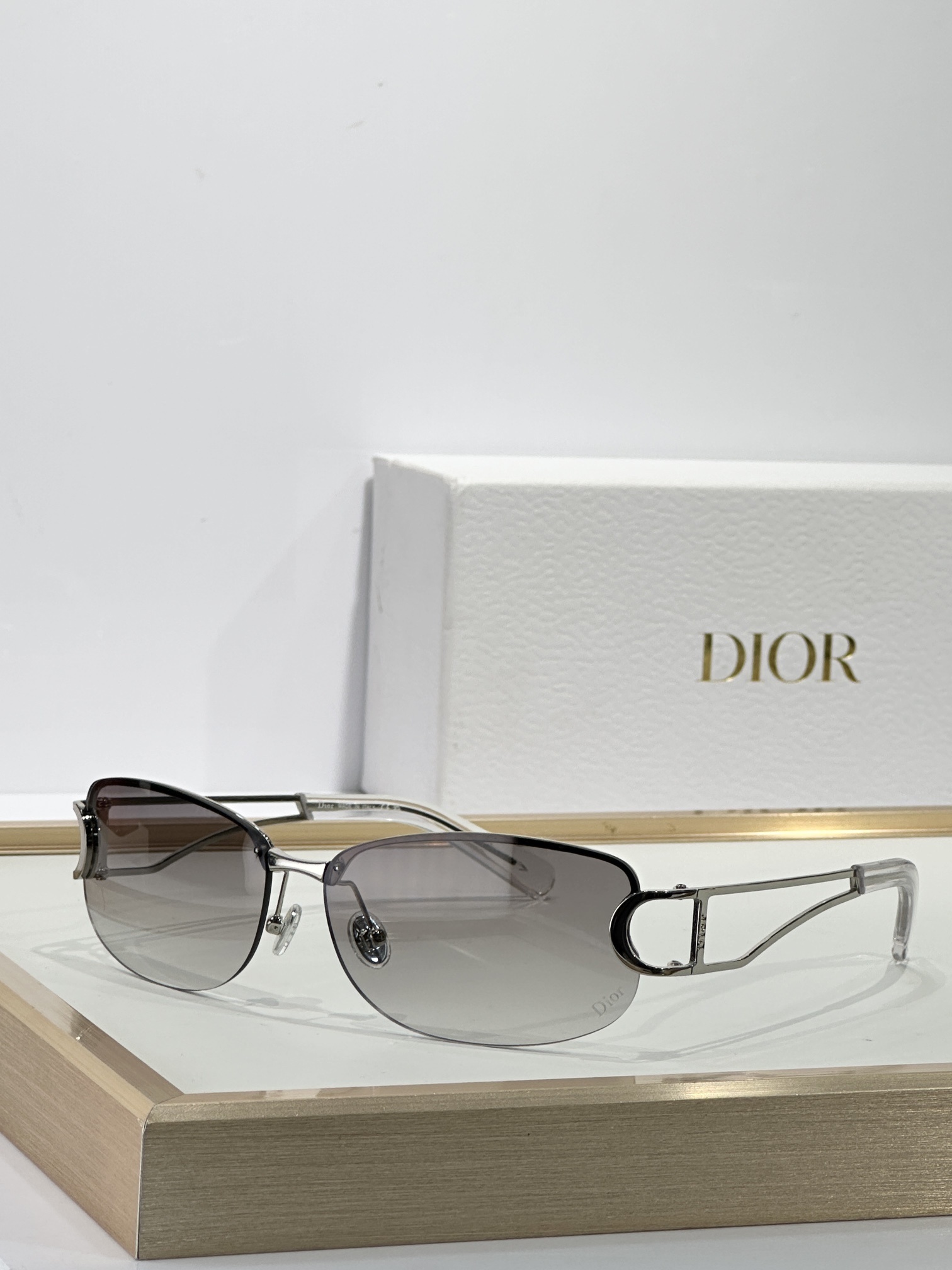 Dior Luxury Rimless Sunglasses – Gold Frame & Brown Lenses