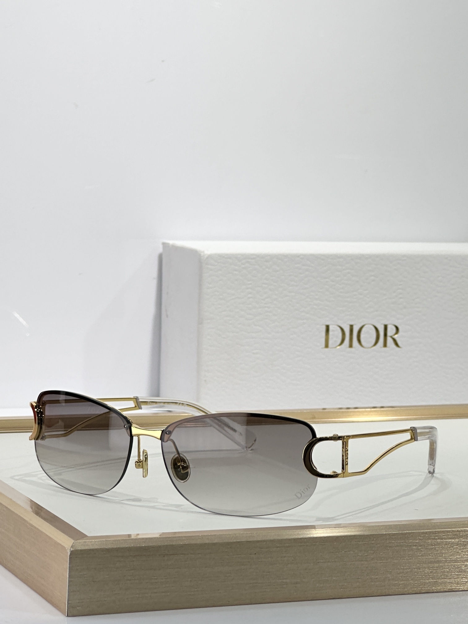 Dior Luxury Rimless Sunglasses – Gold Frame & Brown Lenses
