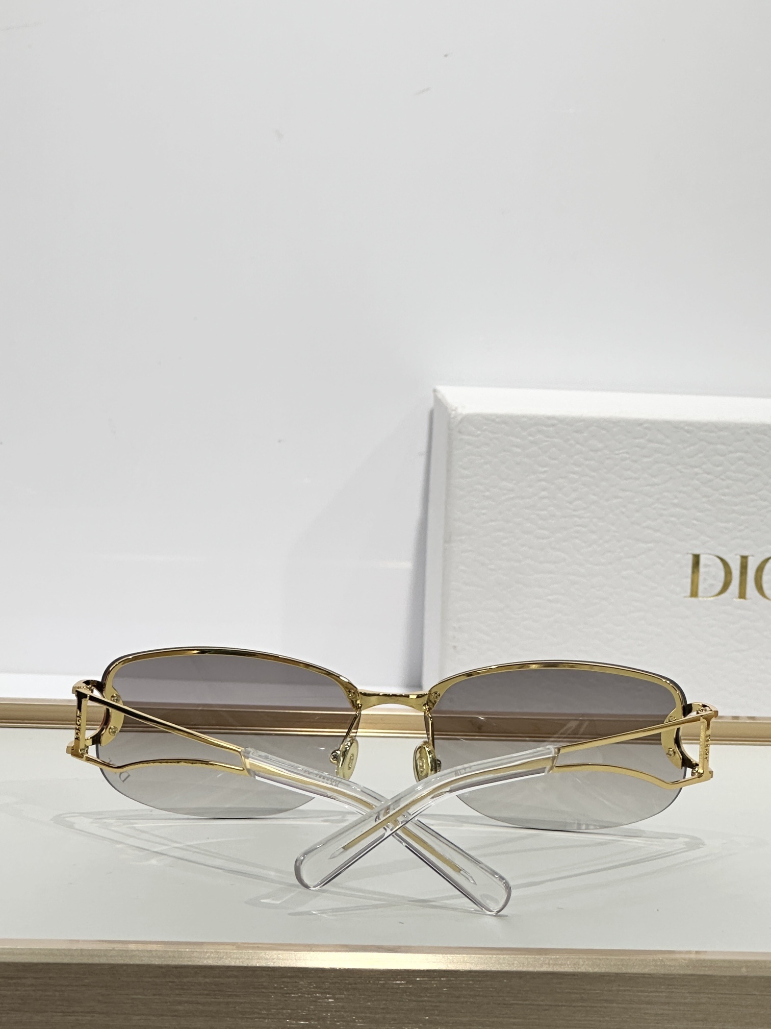 Dior Luxury Rimless Sunglasses – Gold Frame & Brown Lenses