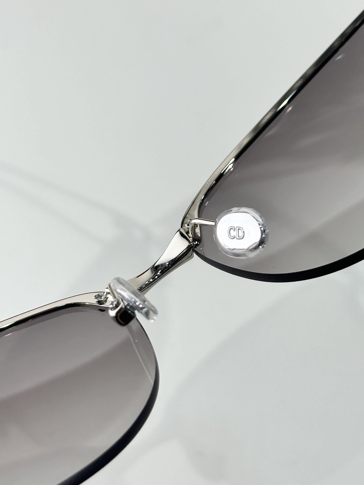 Dior Luxury Rimless Sunglasses – Gold Frame & Brown Lenses
