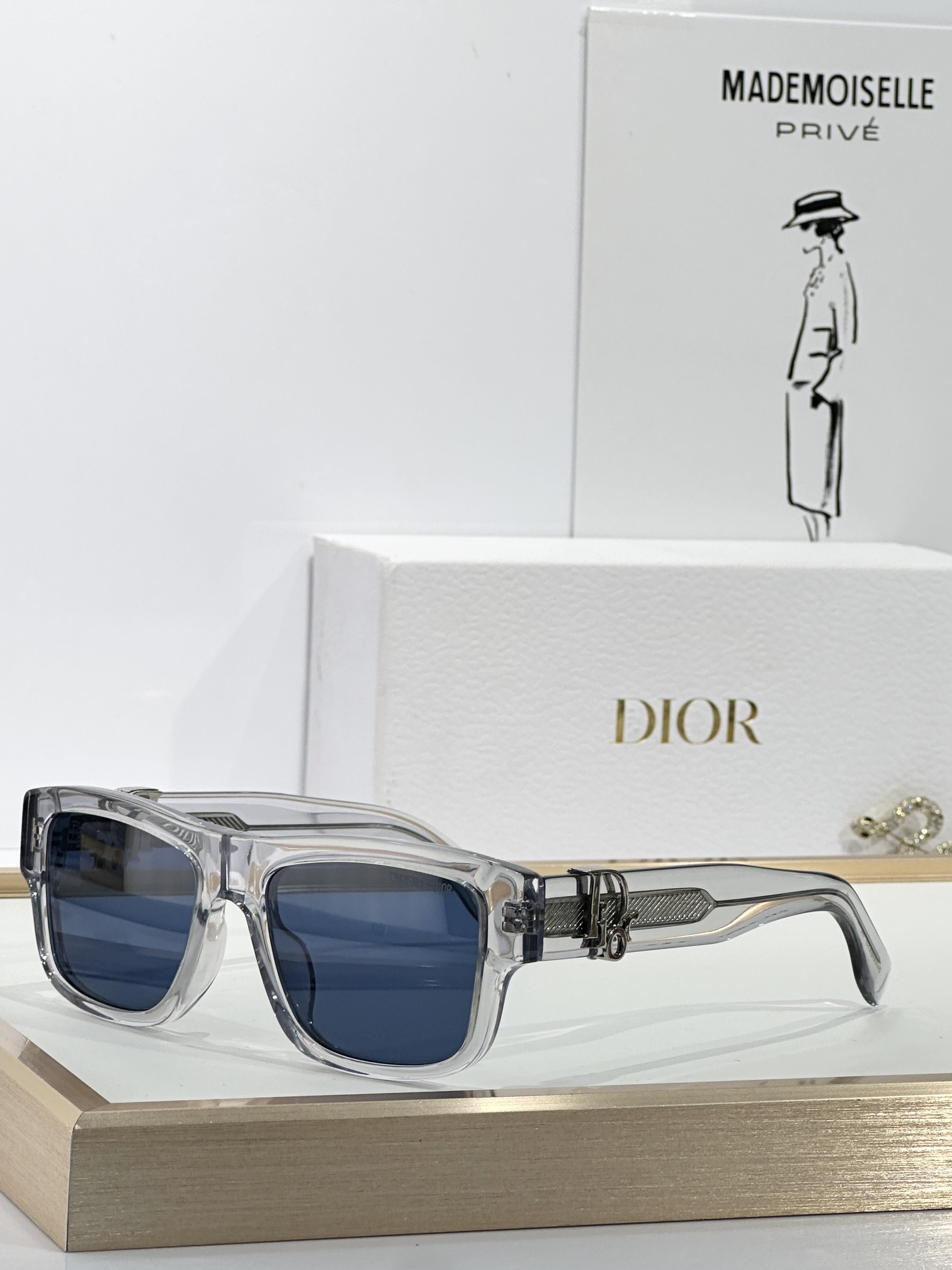 Dior Transparent Grey Rectangular Sunglasses – Blue Lens
