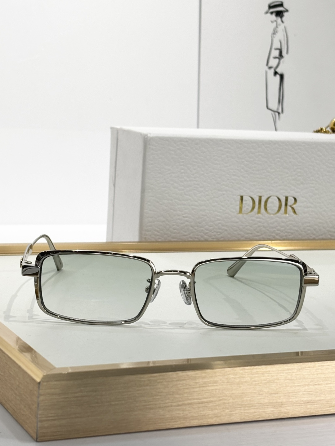 Dior Silver Rectangular Glasses with Light Green Lenses