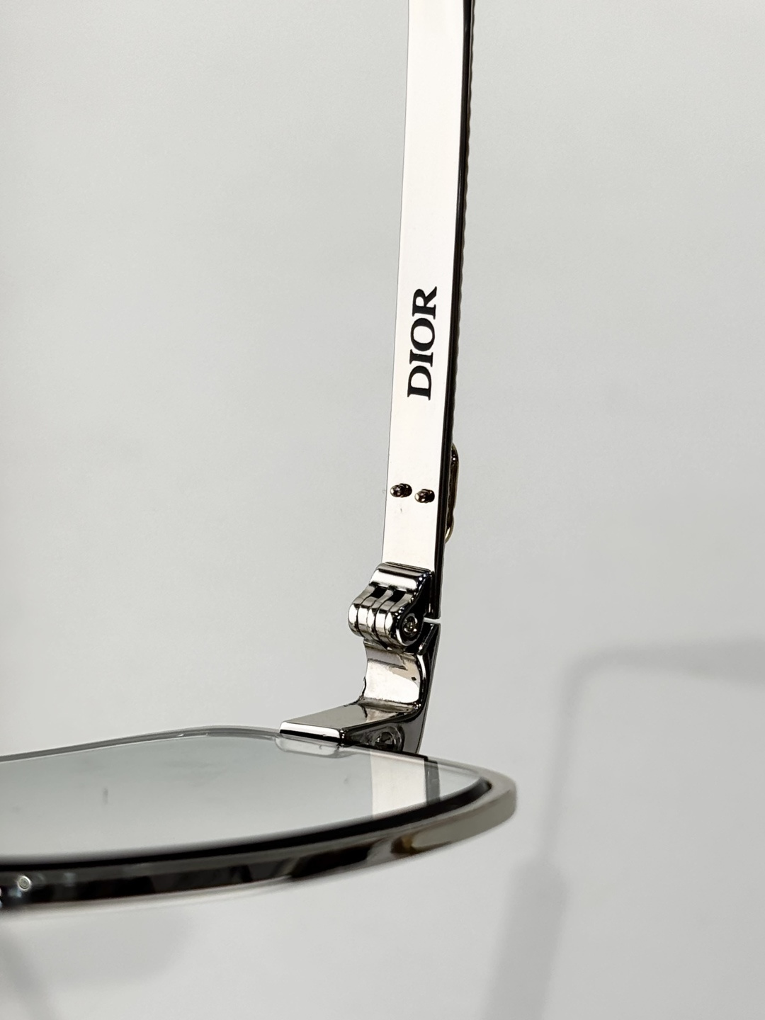 Dior Silver Rectangular Glasses with Light Green Lenses