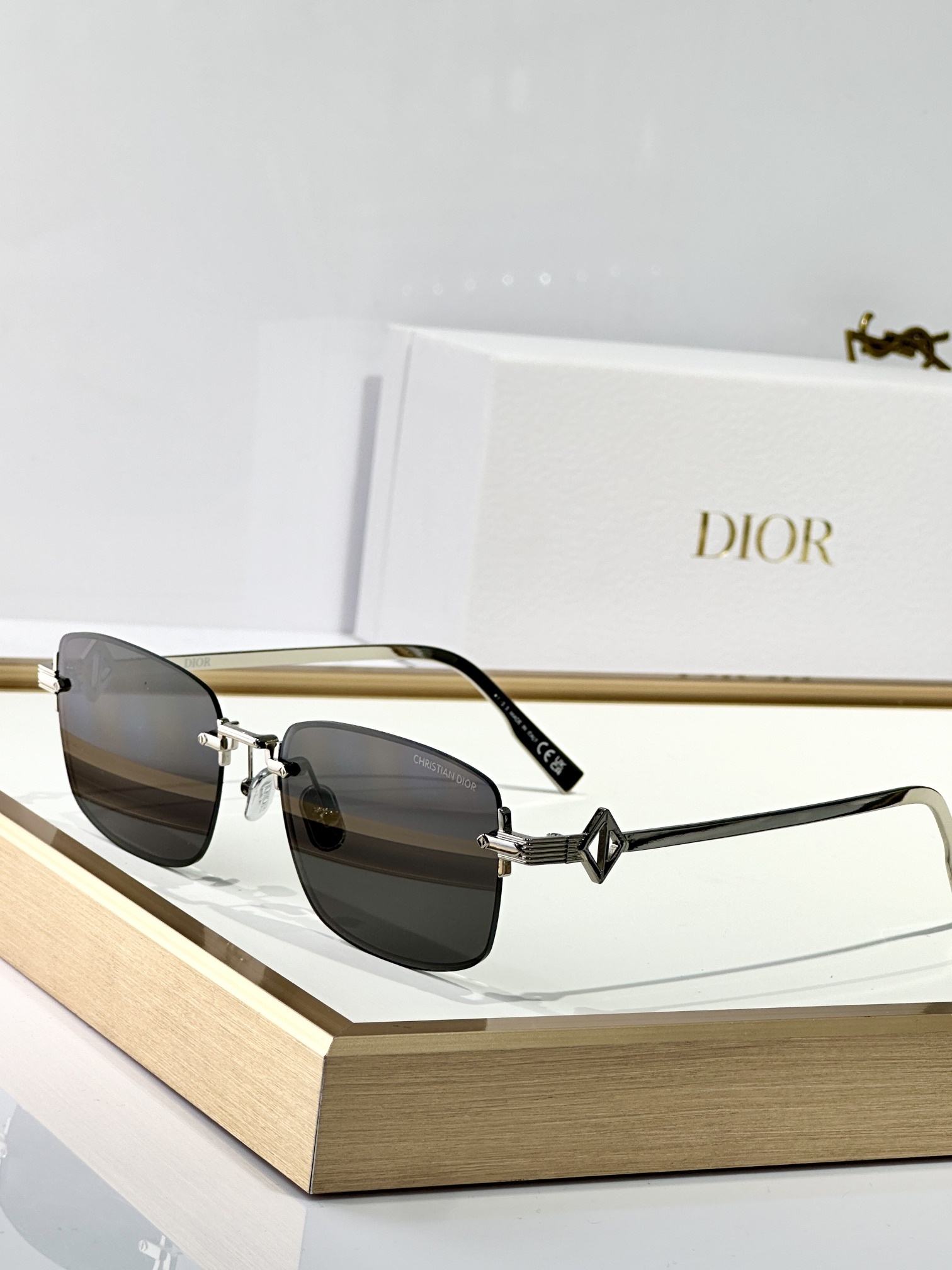 Christian Dior Luxury Rimless Sunglasses with Metal Temples