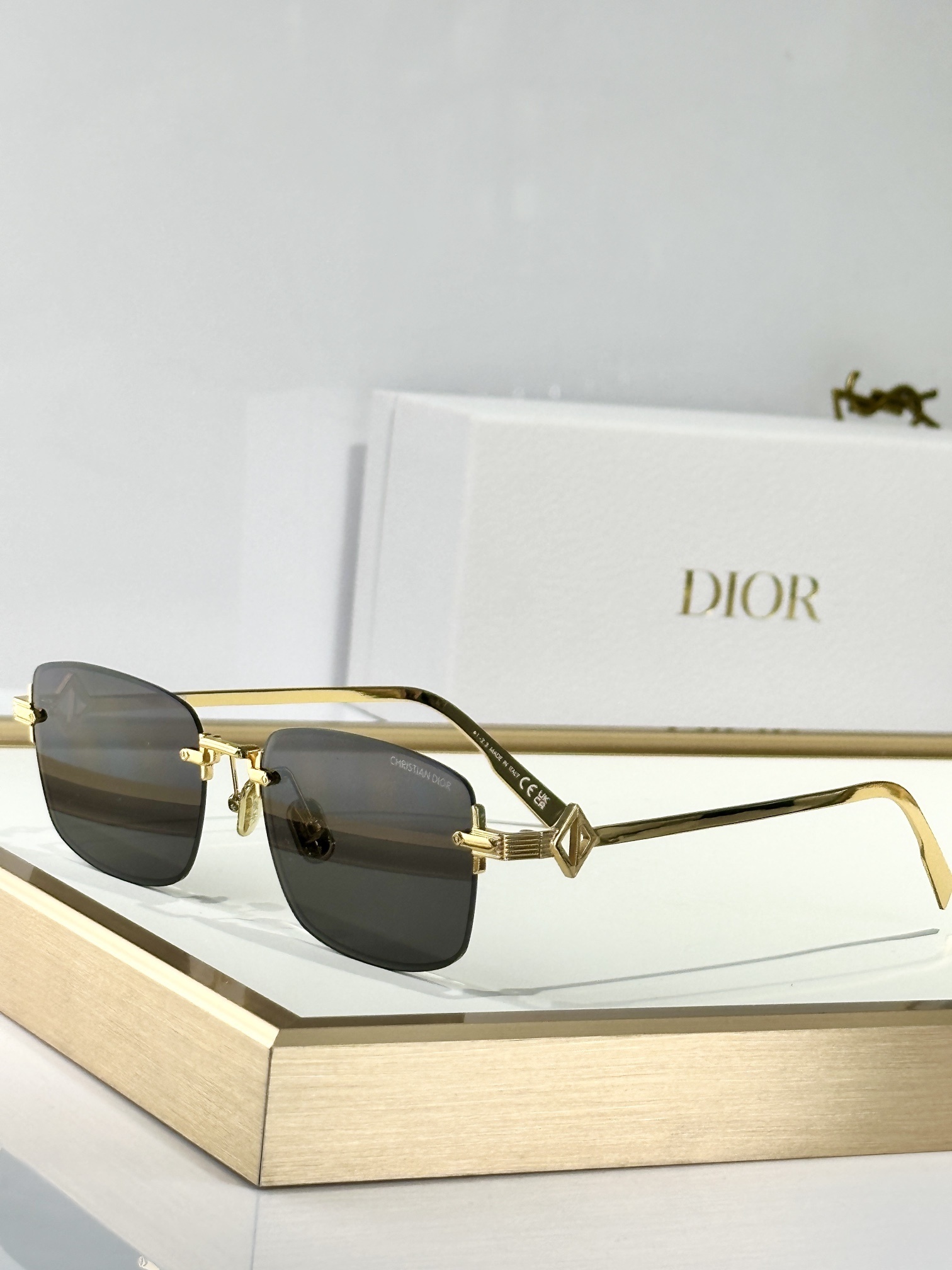 Christian Dior Luxury Rimless Sunglasses with Metal Temples