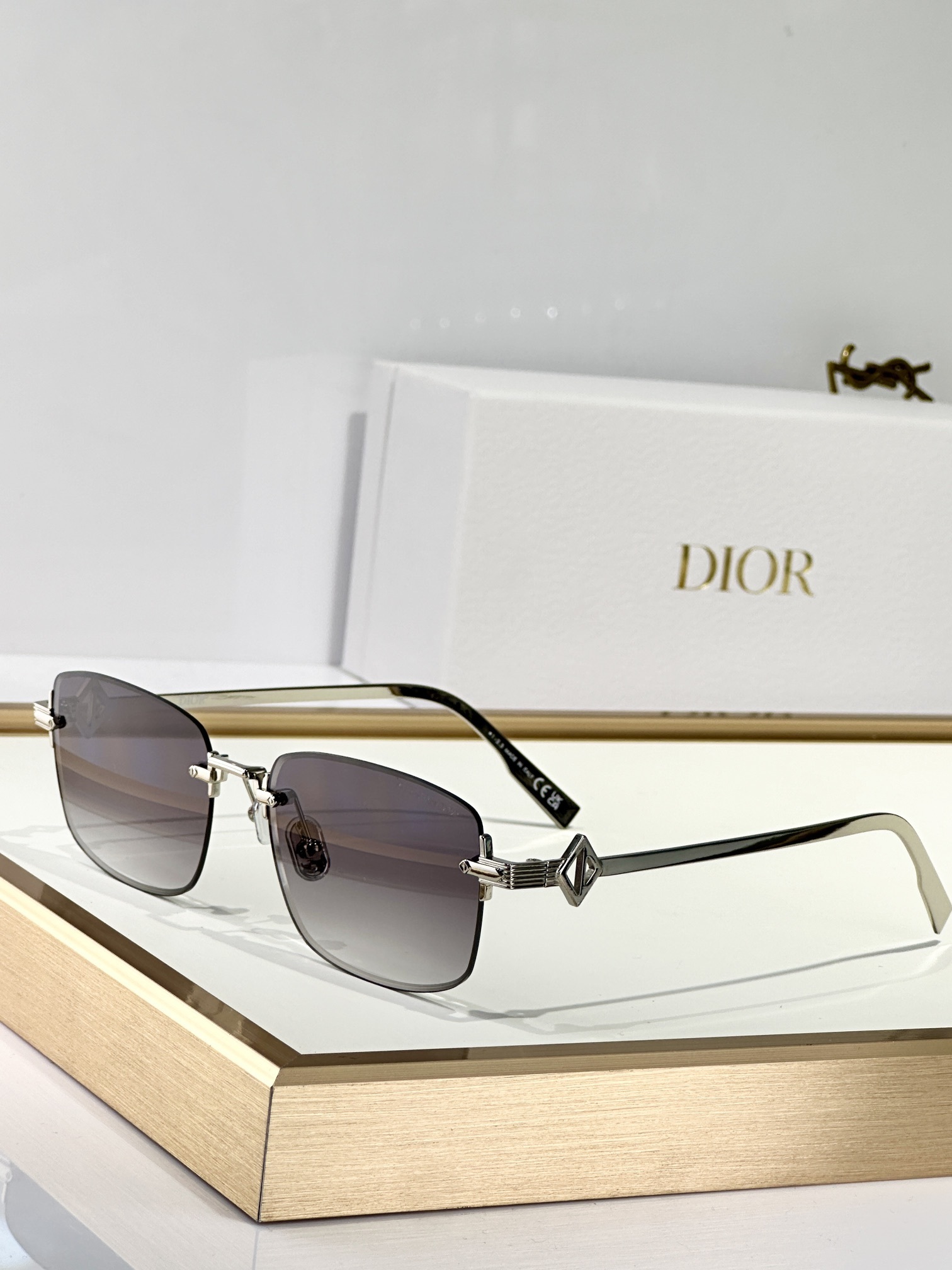 Christian Dior Luxury Rimless Sunglasses with Metal Temples