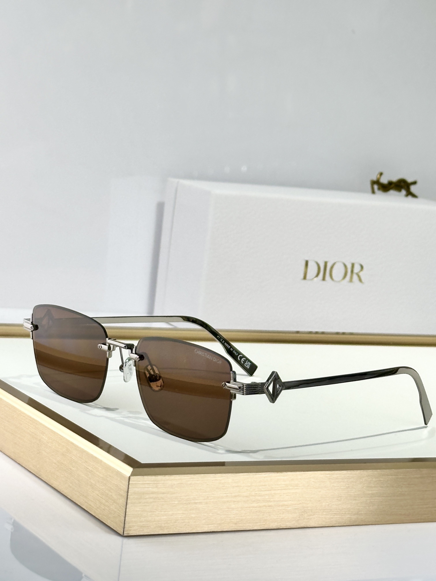 Christian Dior Luxury Rimless Sunglasses with Metal Temples