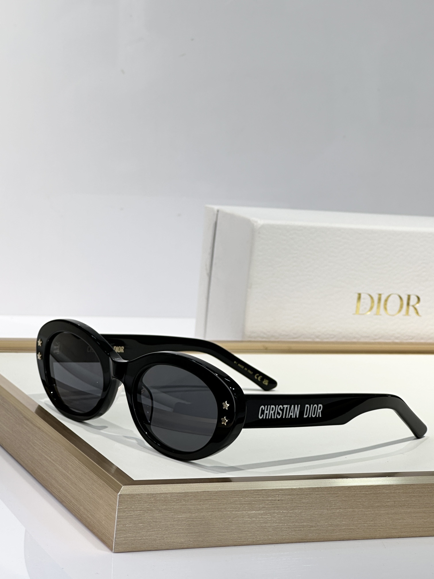 Christian Dior Luxury Retro Oval Sunglasses with Star Accents