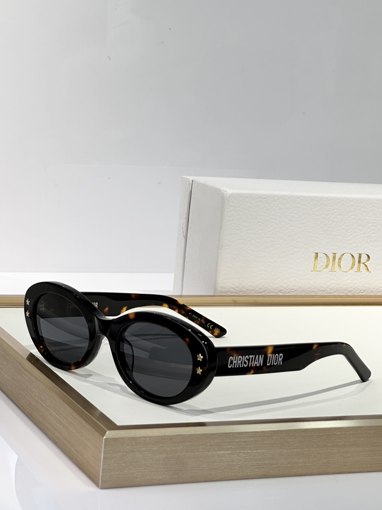 Christian Dior Luxury Retro Oval Sunglasses with Star Accents