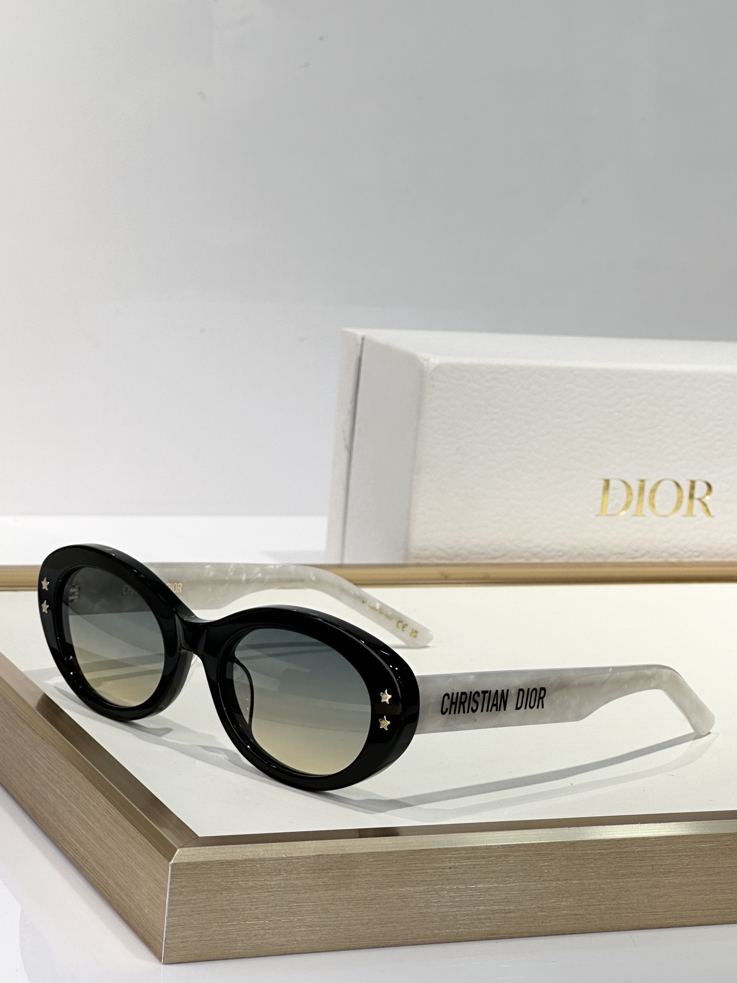 Christian Dior Luxury Retro Oval Sunglasses with Star Accents