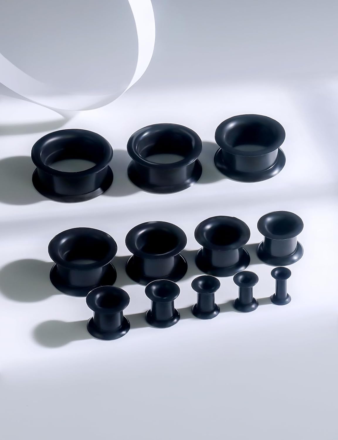 Qiwnswoy Ears Gauges Tunnels Plugs for Women Double Flared Silicone Ear Gauge Stretching Kit 6G to 1" (4MM- 25MM) Expander Stretcher Plug Earrings for Piercing Jewelry for Women (Black White Clear)