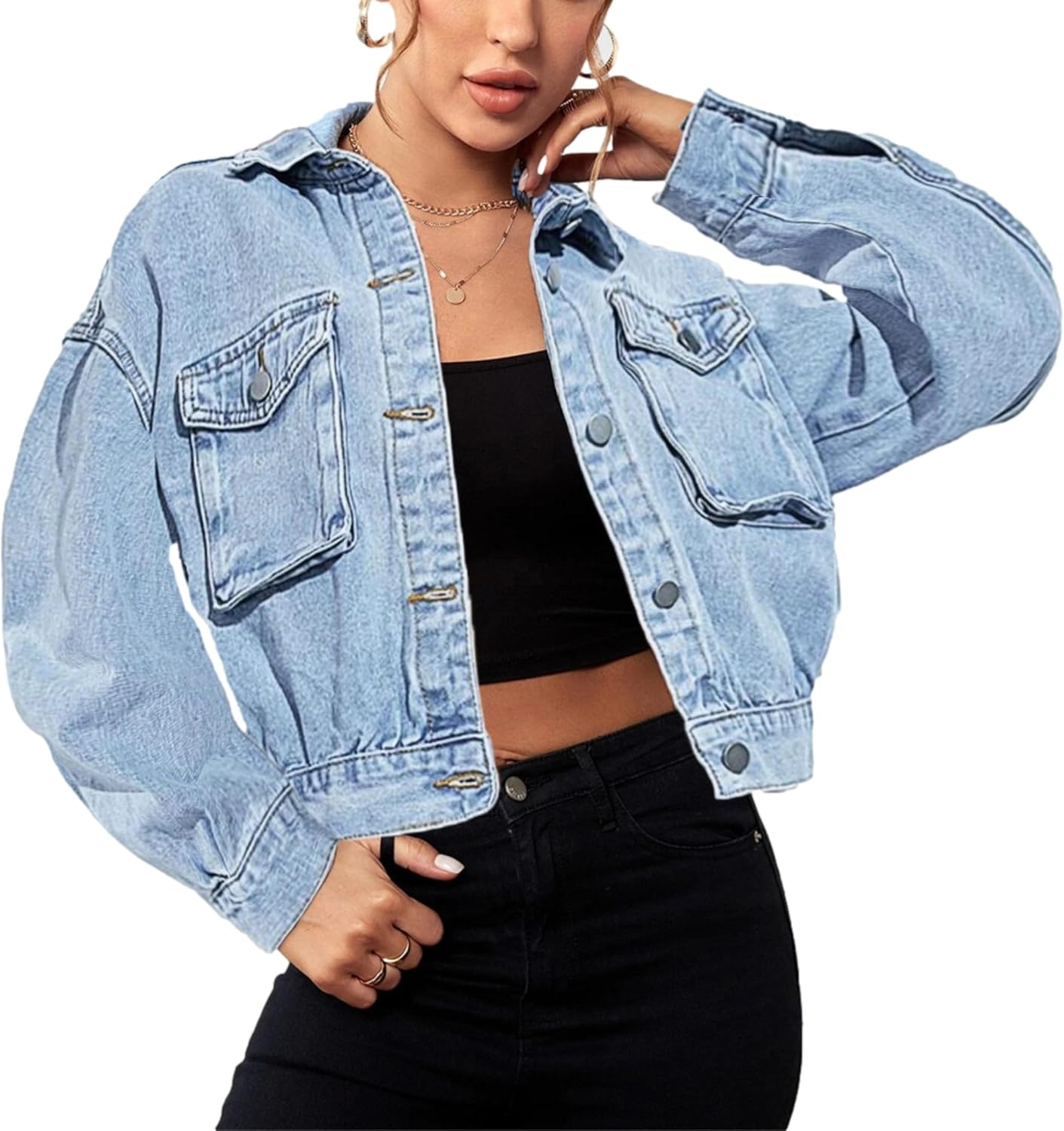 Denim jacket styled with a black crop top, accessorized with layered necklaces and rings, perfect for casual fashion.