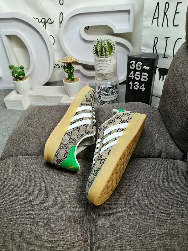 Shoes Adidas 134D uses soft fiber cow split leather combined with imported mercerized pig leather upper material #Leather lining with shock-absorbing PU latex foot pad #External wear-resistant outsole “Retro Sports” latest cross-border collaboration, Italian luxury brand-Gucci Gucci x German sports brand Adidas Adi28