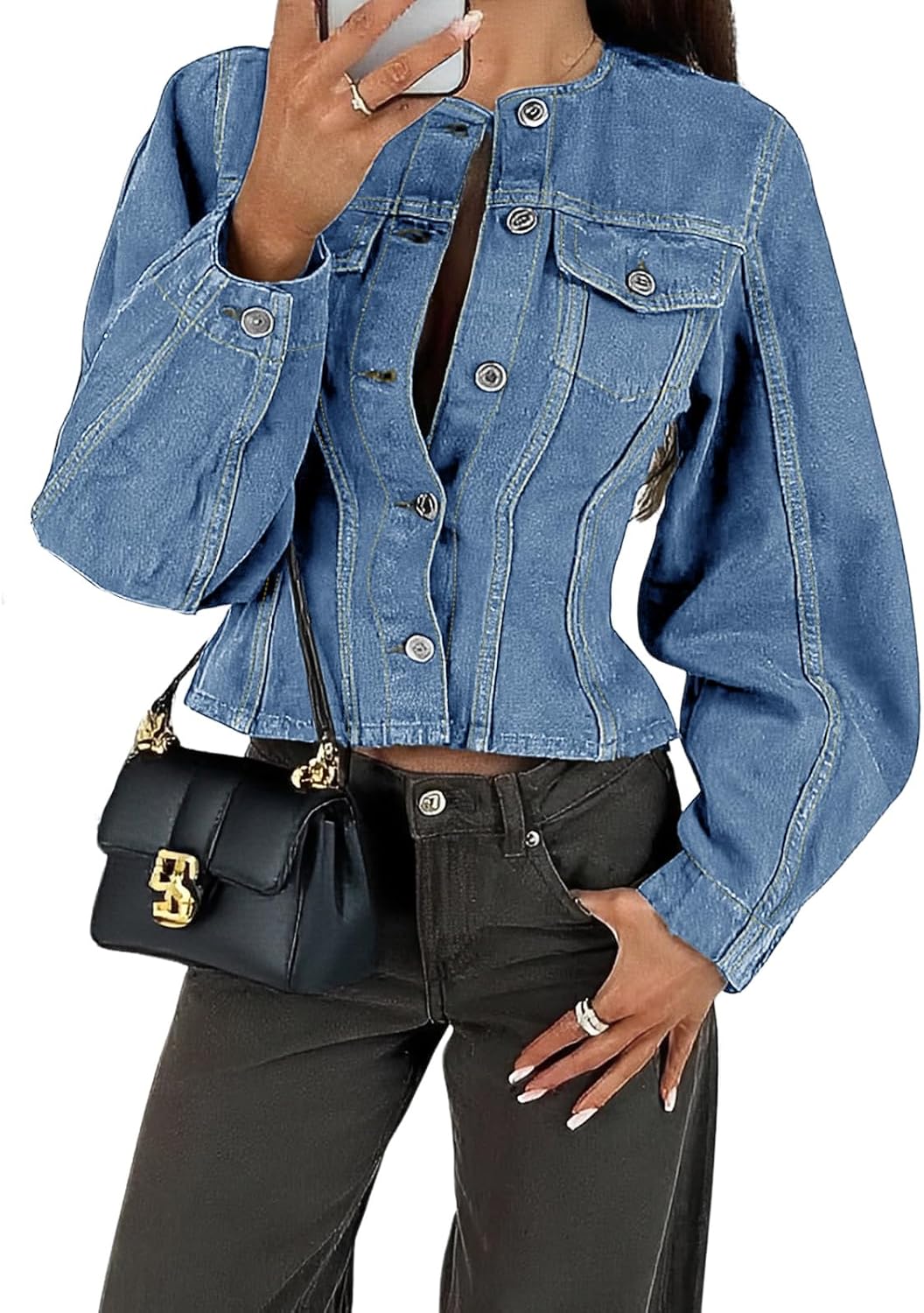 Denim jacket and stylish handbag in a fashion-forward look.