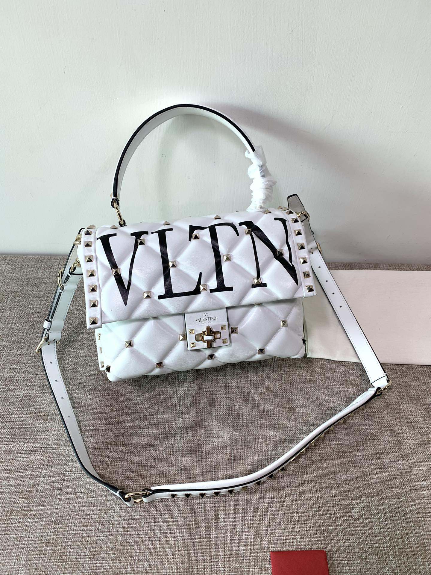 Valentino Garavani Rockstud Top Handle Leather Crossboday Bag on SALE